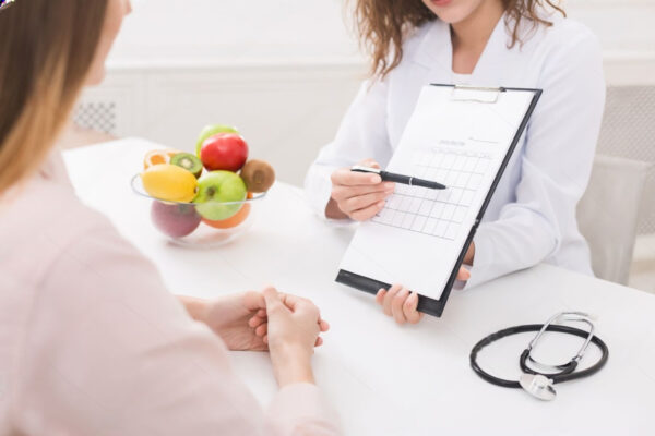 stock-photo-food-coaching-professional-dietitian-explaining-meal-plan-to-patient-at-consultation-1310057731(1) Life Coaching