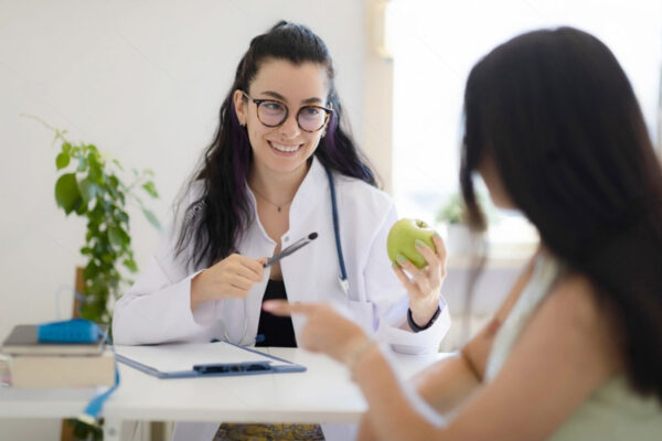 stock-photo-smiling-female-doctor-nutritionist-giving-consultation-about-diet-plan-and-healthy-eating-to-the-2179411499(1) Workshops & Retreats